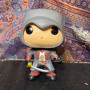 Funko Action Figure with Gray and Red Outfit